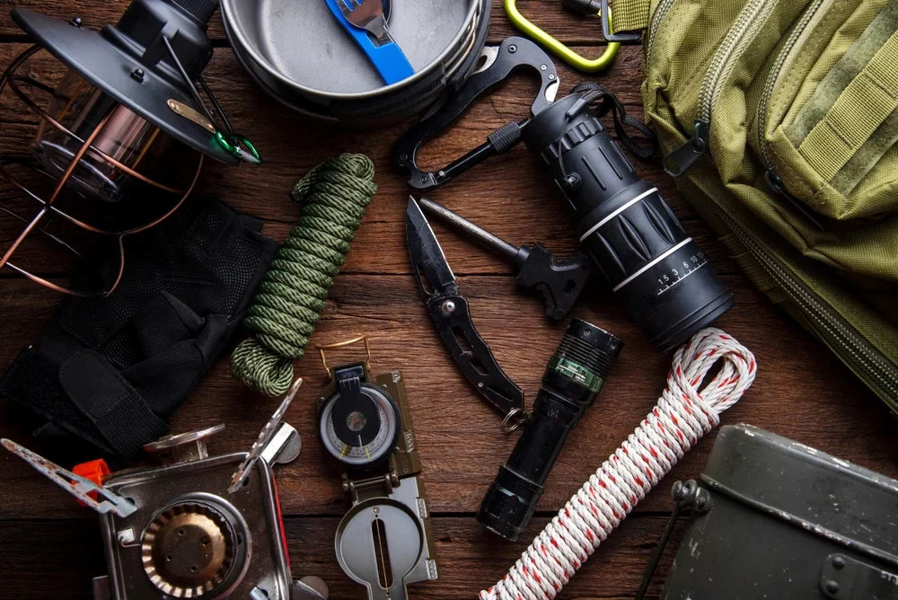 A layout of tactical gear to be stored in an outdoor bag