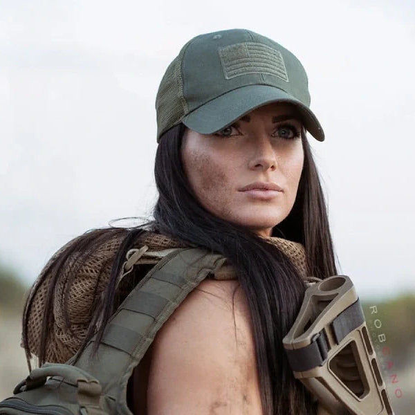 Woman in an American Flag Hat and Tactical Gear