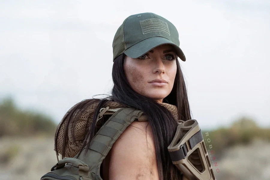 Woman in an American Flag Hat and Tactical Gear